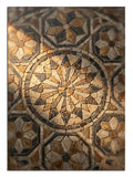 Taş işçiliğiyle yapılmış klasik ve karmaşık mandala deseni.