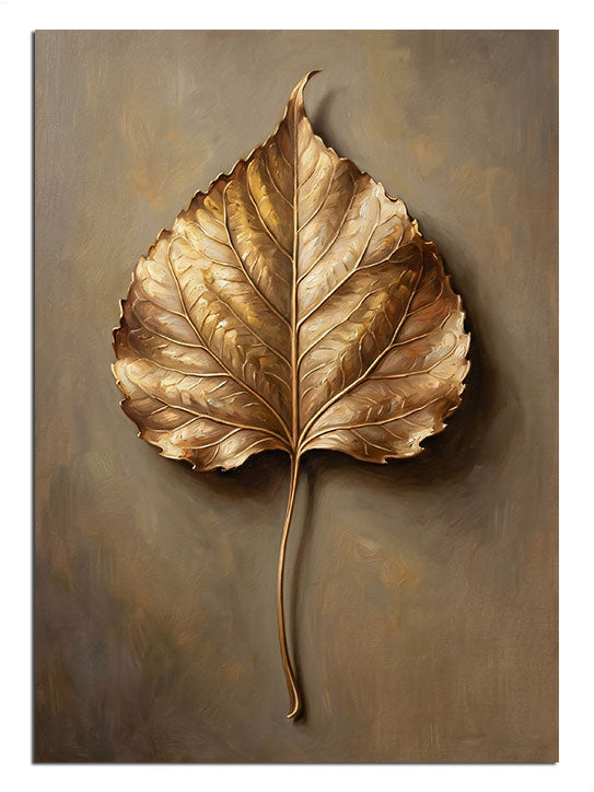 Bej fonda tek altın yaprak, minimalist sonbahar tablosu.