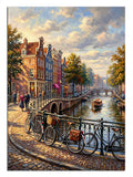 Amsterdam kanalı, köprü ve bisikletler ile şehir manzarası tablosu.