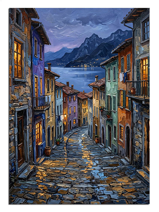 Gece ışıklı renkli evlerin sokağı ve dağ manzarası tablosu.